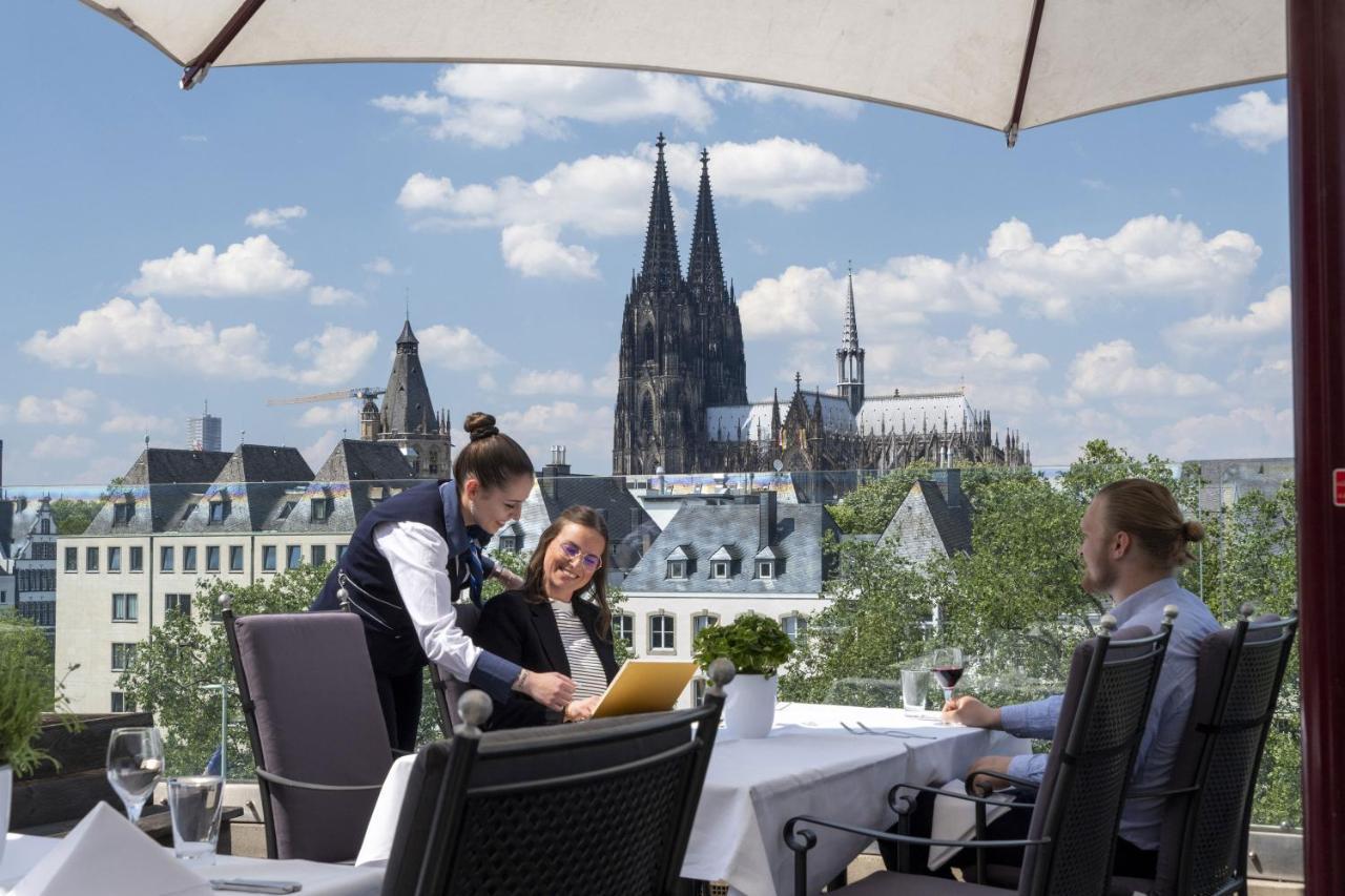 Maritim Hotel Koln Exterior photo The view from the terrace of the restaurant
