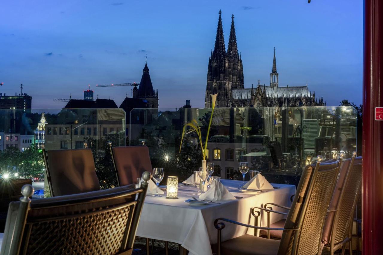 Maritim Hotel Koln Exterior photo The view of the Cologne Cathedral from the terrace of the restaurant