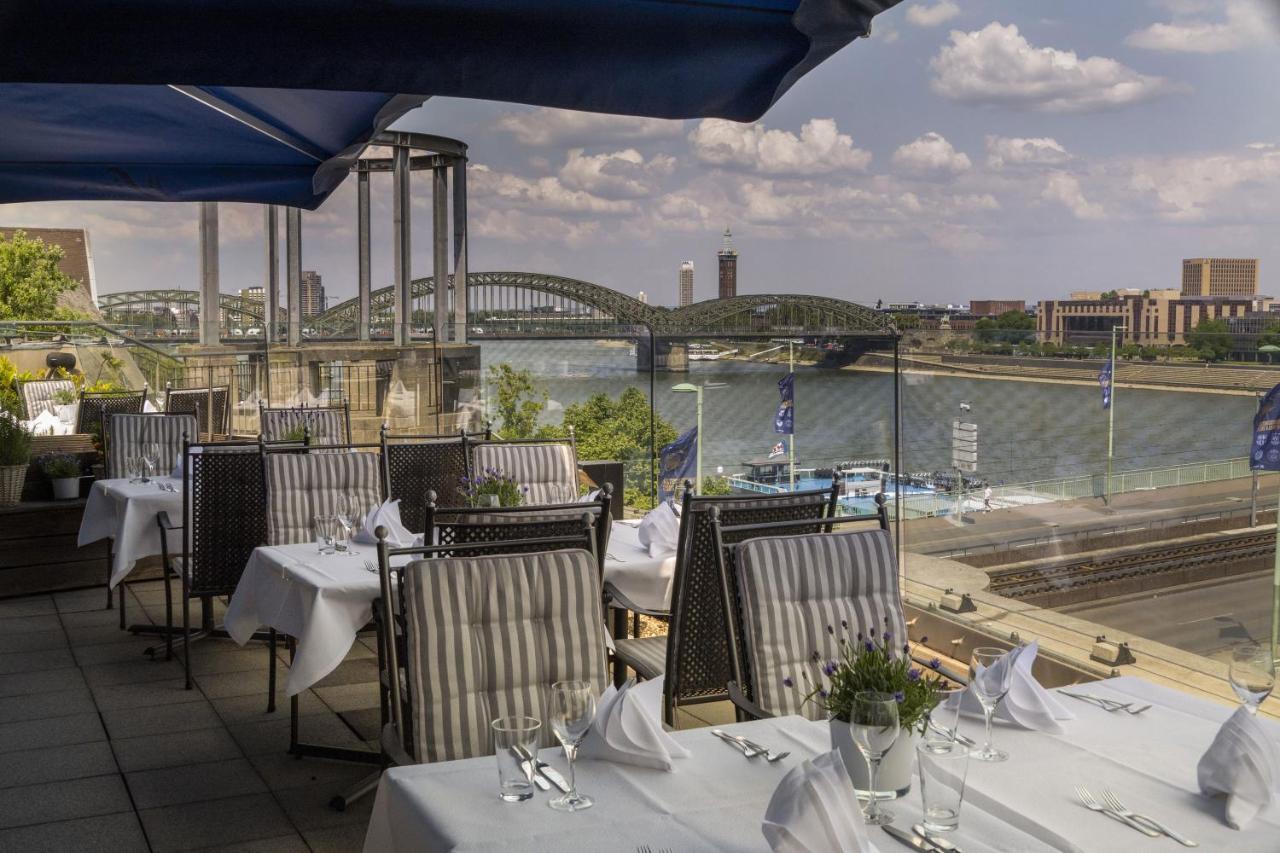 Maritim Hotel Koln Exterior photo The view from the restaurant